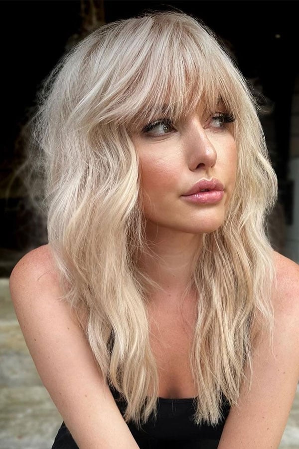 Mid-Back Platinum Blonde Shag With Soft Waves — Shag Haircut