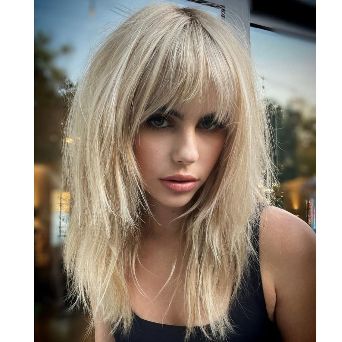 Mid-Back Platinum Shag With Choppy Fringe — Shag Haircut