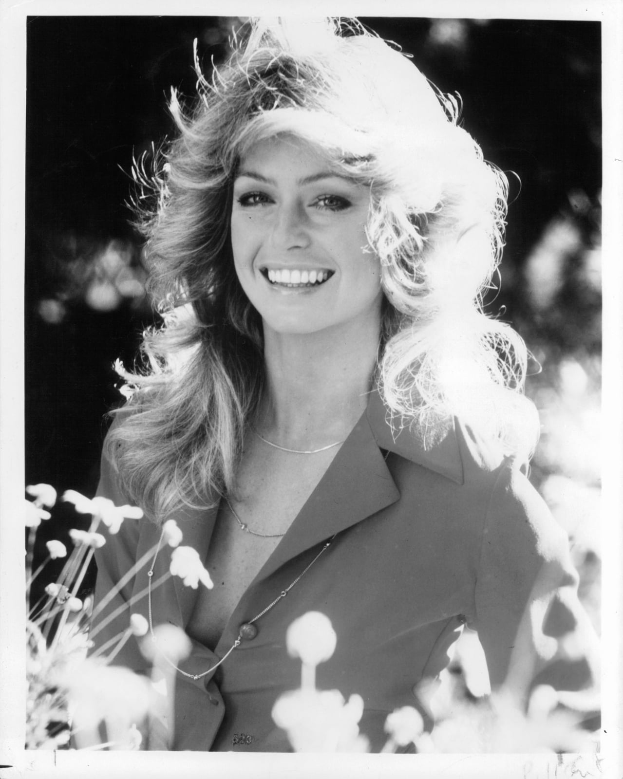 Shoulder Length Blonde Shag With Feathered Bangs — Shag Haircut