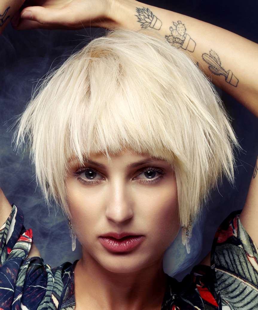 Platinum Blonde Shaggy Bob With Blunt Bangs, Chin Platinum Blonde Shaggy Bob With Blunt Bangs, Chin
