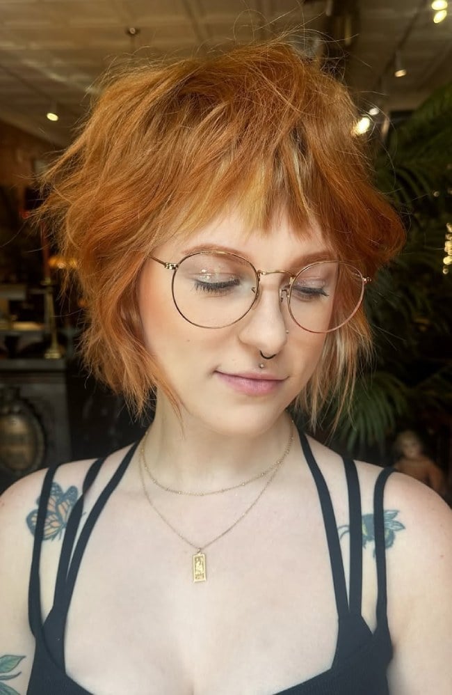 Vibrant Copper Shaggy Bob With Wispy Bangs Vibrant Copper Shaggy Bob With Wispy Bangs