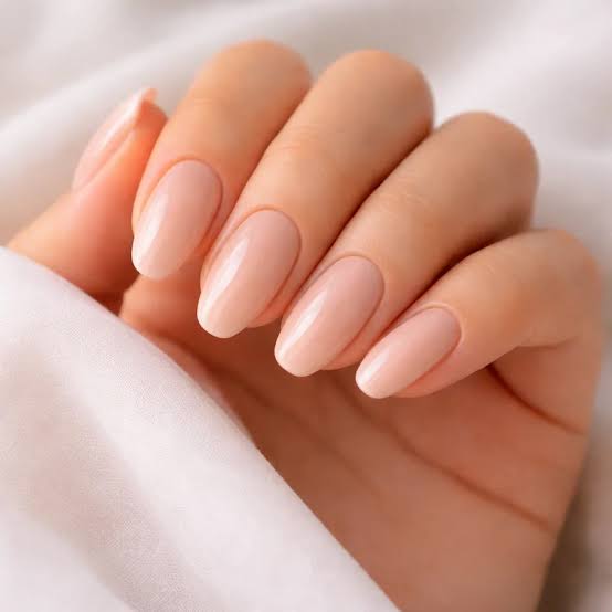 Sheer Milky Nude Glossy Short Oval Nails, Close-Up Take Sheer Milky Nude Glossy Short Oval Nails, Close-Up Take