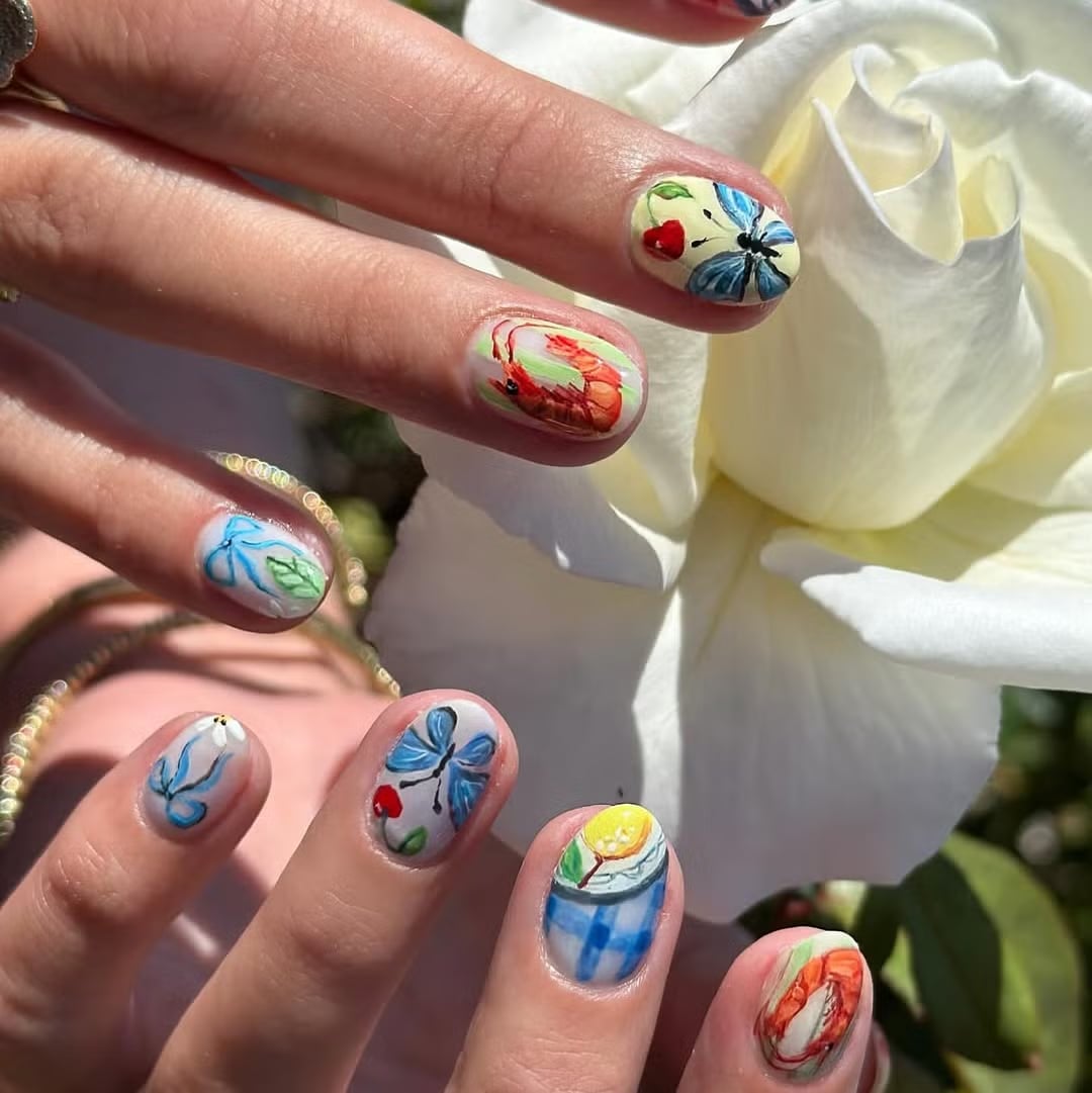 Whimsical Hand-Painted Art Short Oval Nails Whimsical Hand-Painted Art Short Oval Nails