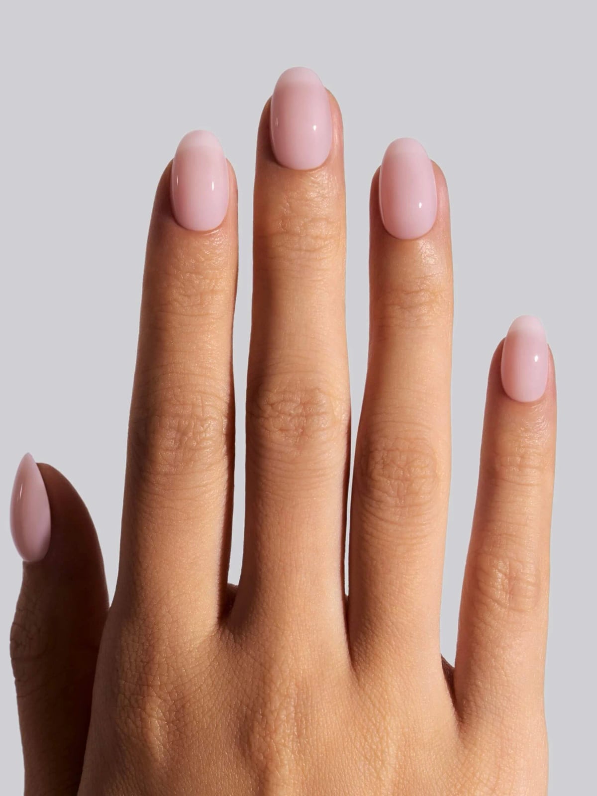 Sheer Milky Pink Glossy Short Round Nails, Giving A Natural Appearance