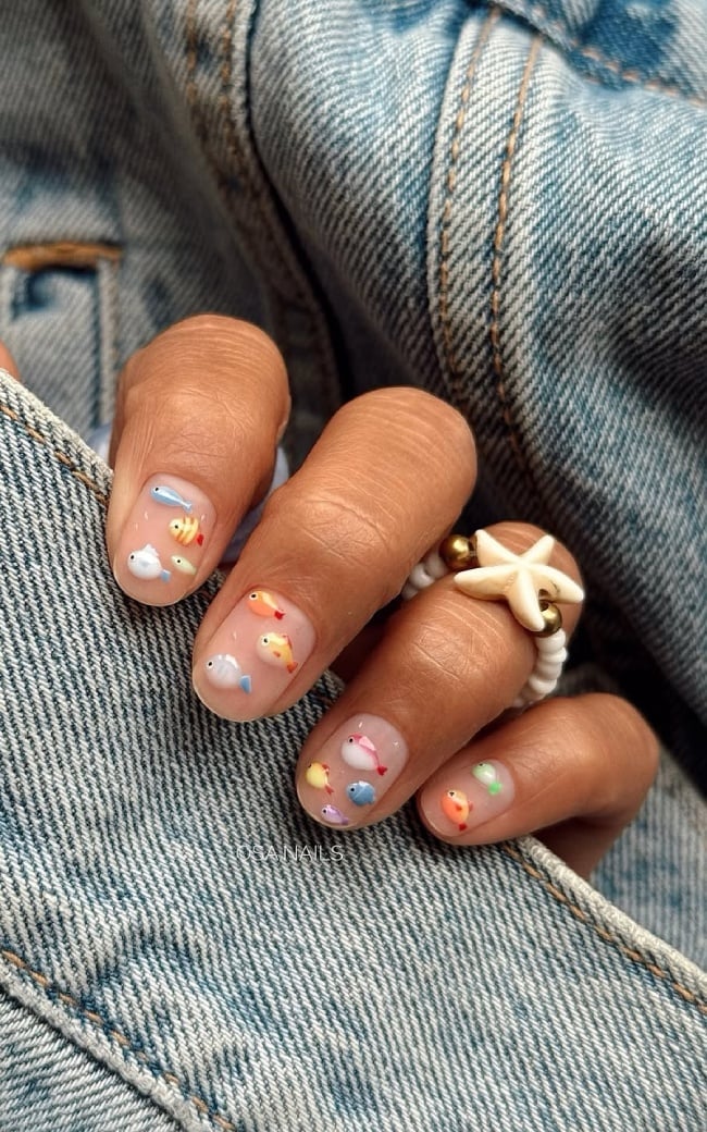 Sheer Nude with Tiny Fish Designs Short Round Nails