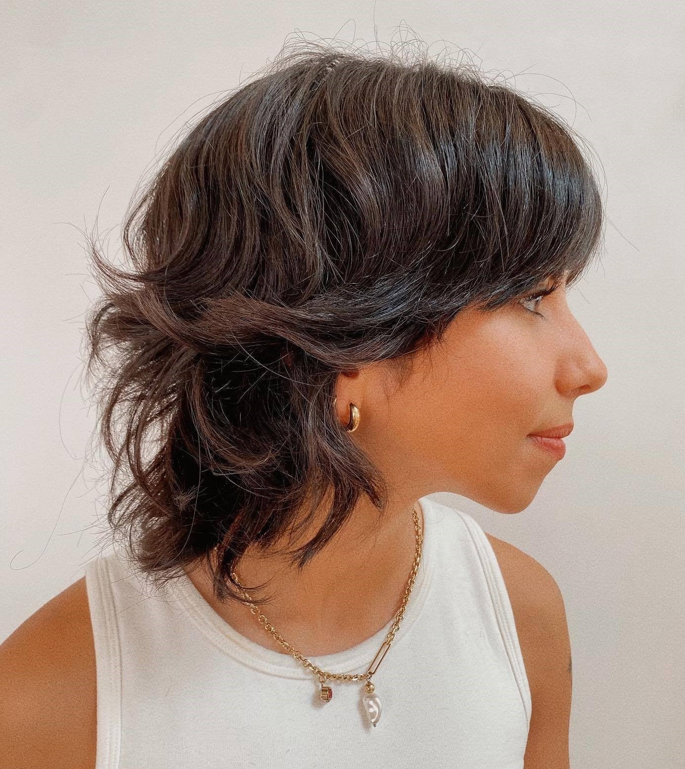 Wavy Dark Brown Wolf Cut With Shaggy Bangs Wavy Dark Brown Wolf Cut With Shaggy Bangs — Short Wolf Cut