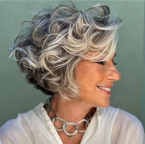 Chin Length Bob With Loose Curls And Gray Highlights Chin Length Bob With Loose Curls And Gray Highlights — Silver Bob