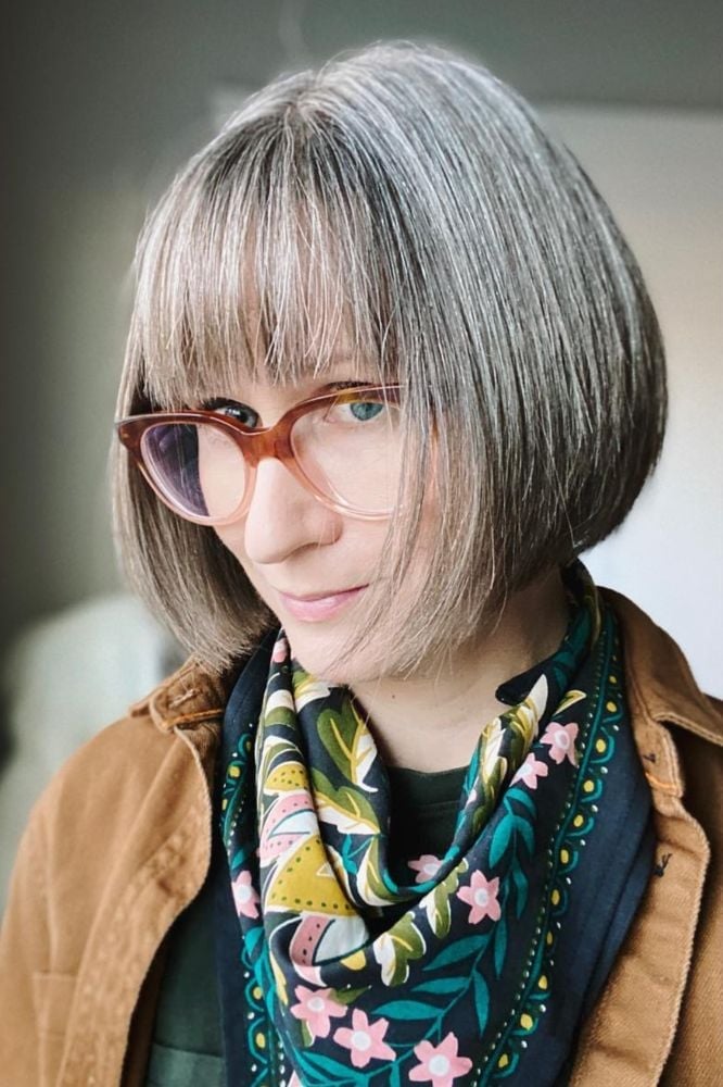 Chin Length Bob With Wispy Bangs Chin Length Bob With Wispy Bangs — Silver Bob