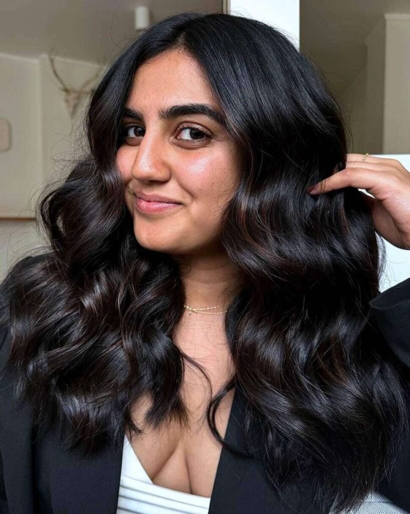 Mid-Back Length Layers With Glossy Waves — Soft Black Hair