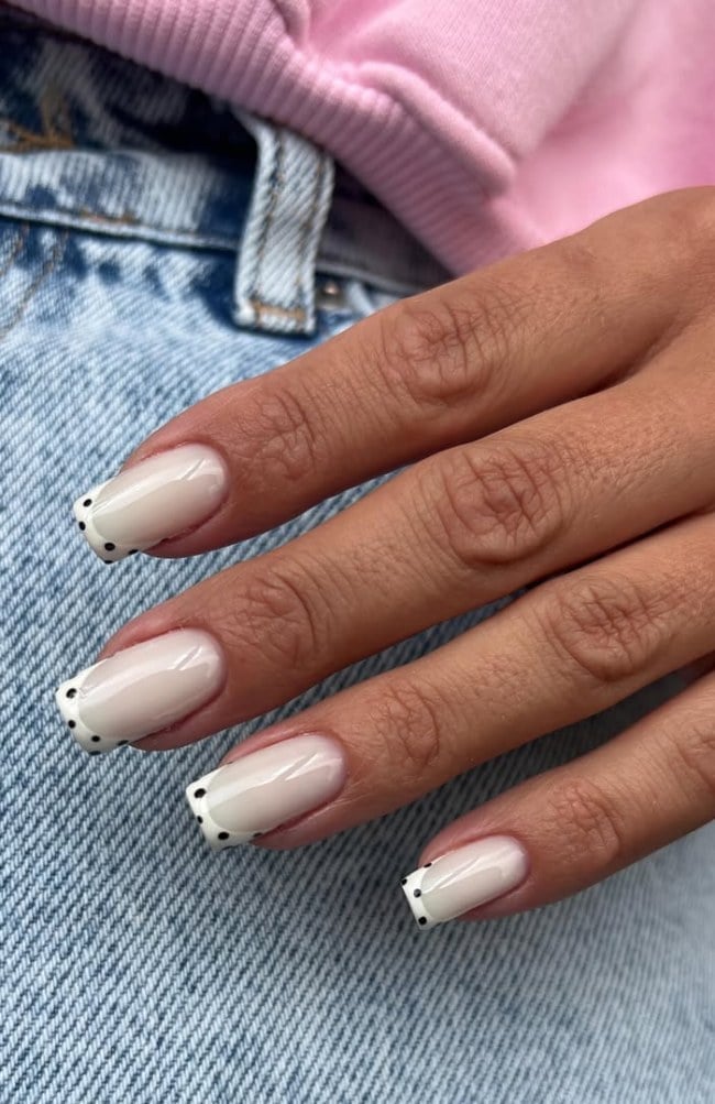 Sheer Pink Square Nails With Polka Dot French, Close-Up Take Sheer Pink Square Nails With Polka Dot French, Close-Up Take