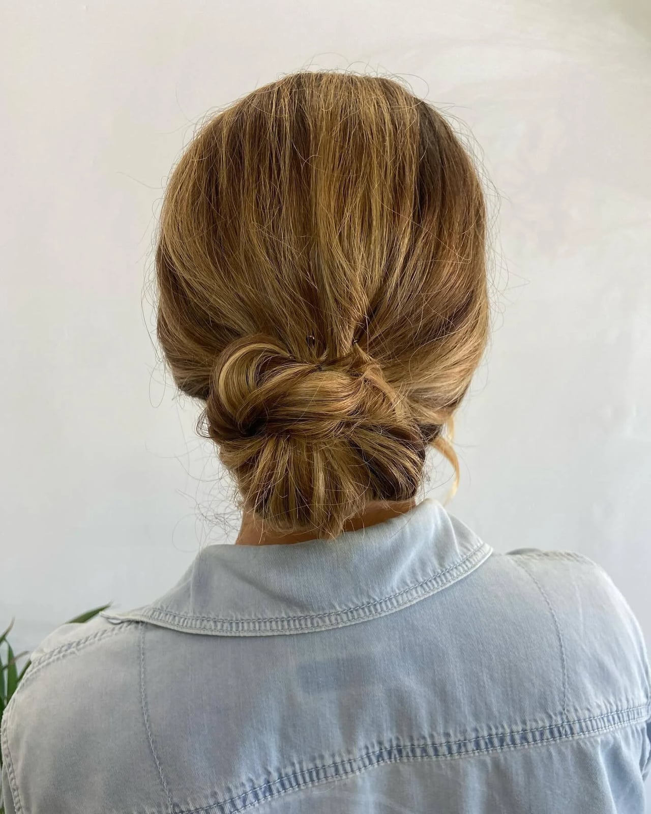 Blonde Twisted Low Bun With Clean Lines — Updos for Short Hair