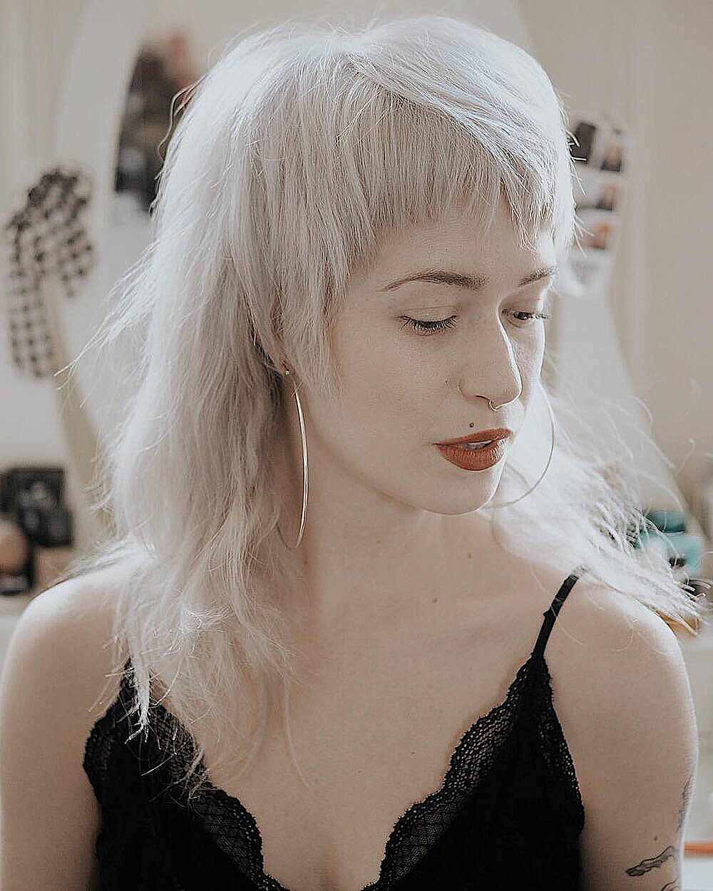 Ash Blonde Shag With Micro Bangs — Vampire Haircut