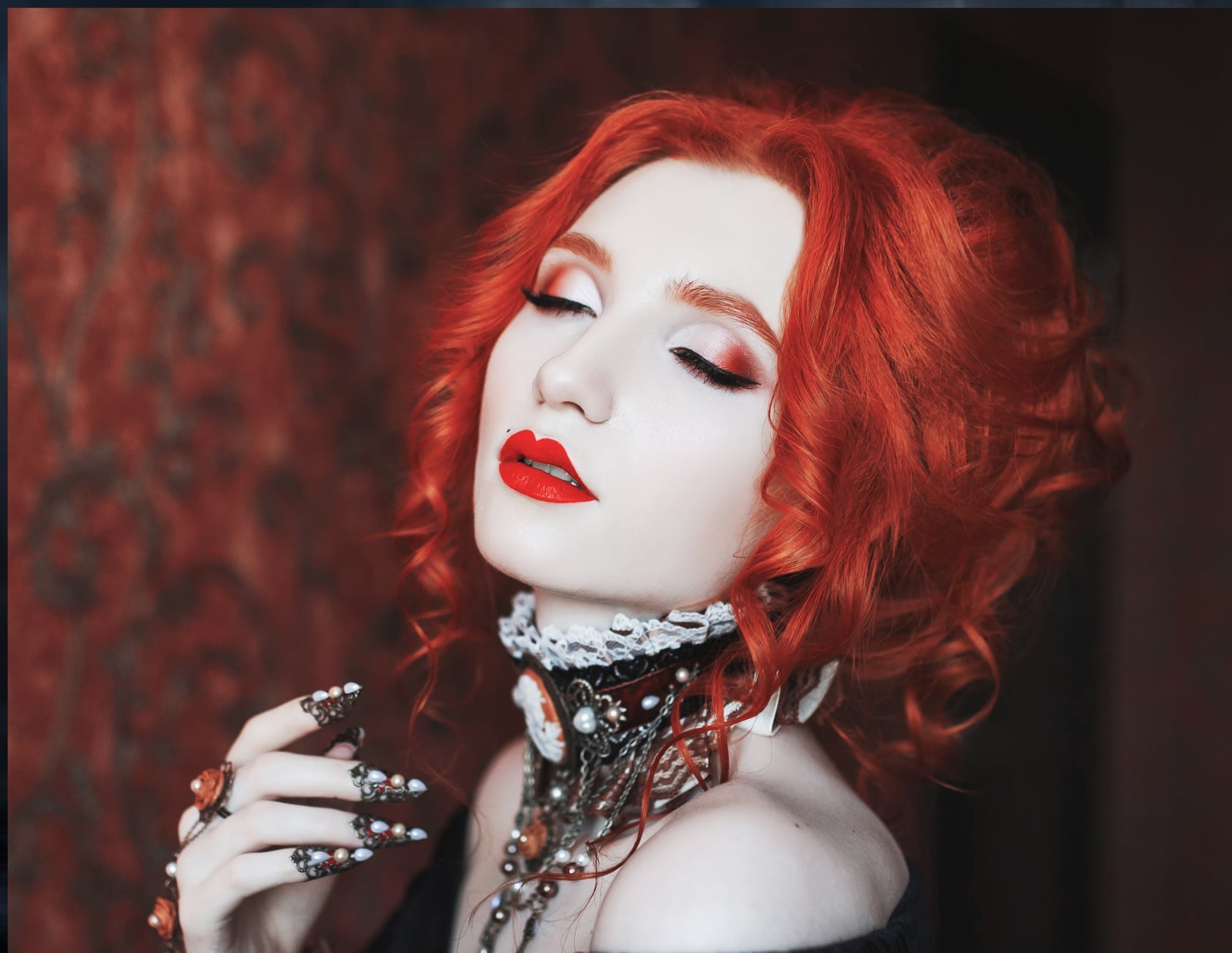 Red Wavy Hair With Curtain Bangs — Vampire Haircut