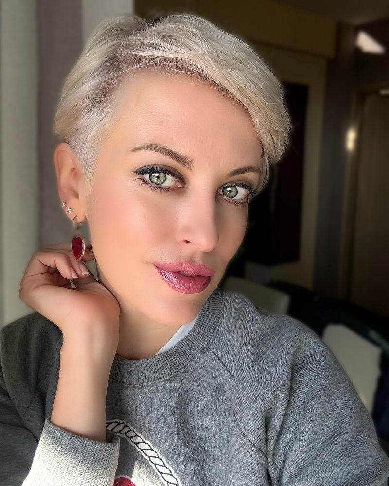 Platinum Blonde Pixie With Swept Forward Bangs — Very Short Haircuts