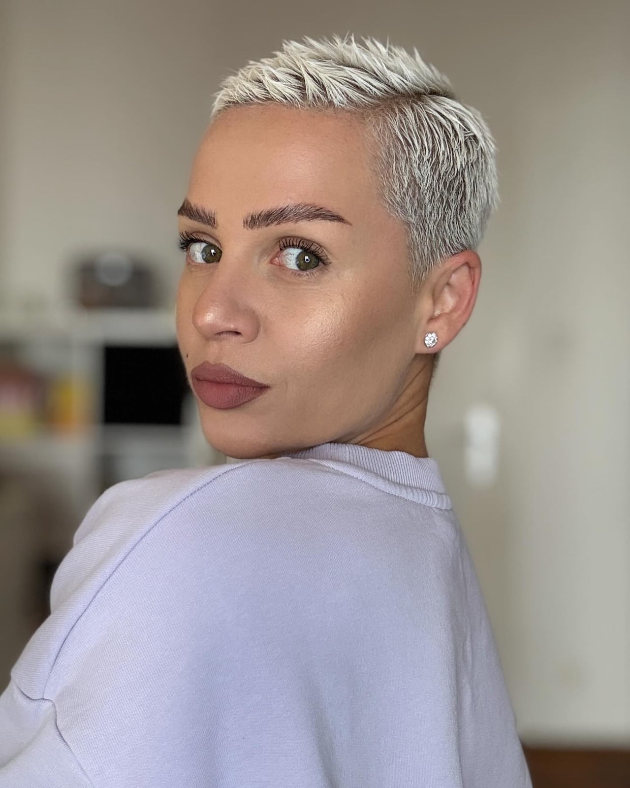 Platinum Blonde Pixie With Slicked Back Style — Very Short Haircuts
