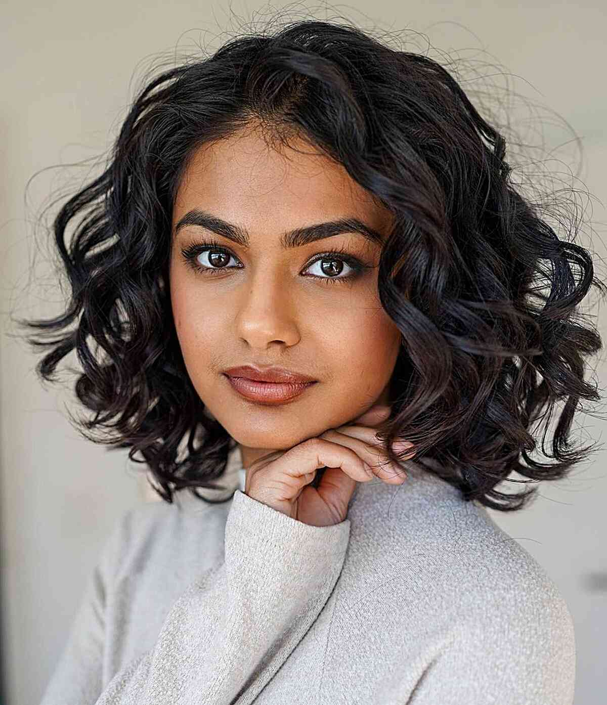 Chin Length Wavy Bob With Curtain Bangs