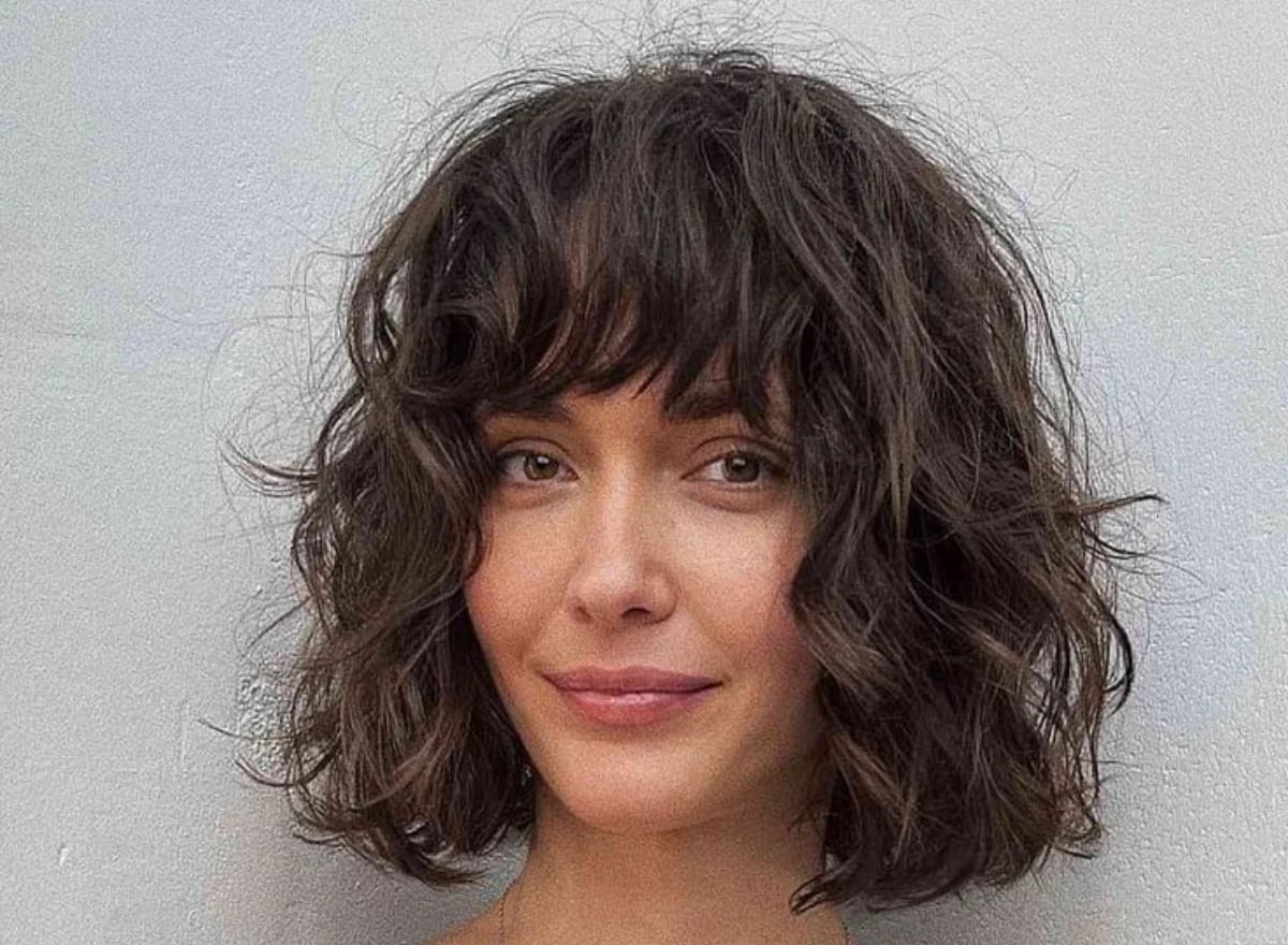 Textured Dark Brown Bob With Curtain Bangs Textured Dark Brown Bob With Curtain Bangs — Wavy Haircuts