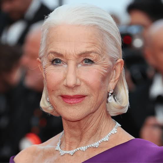 Chin Length White Bob Tucked Behind Ears — White Hair