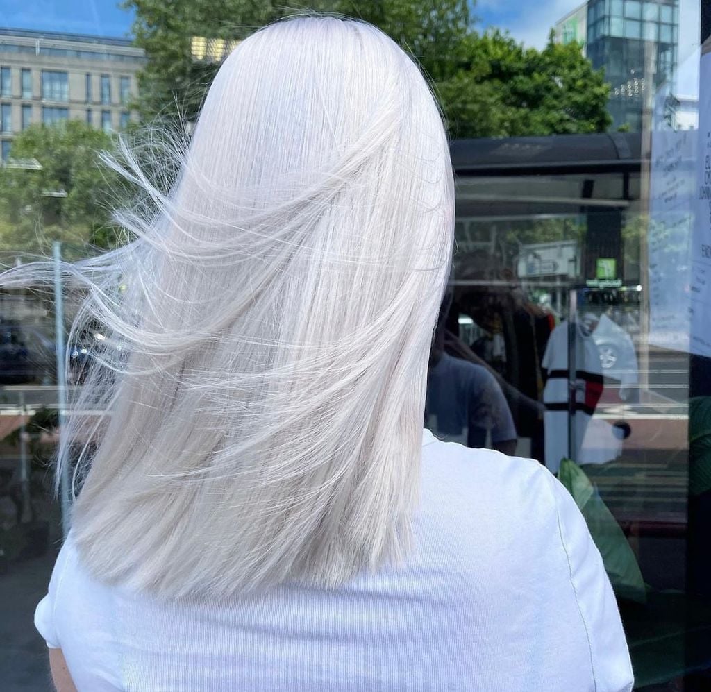 Shoulder Length White Layers With Volume — White Hair