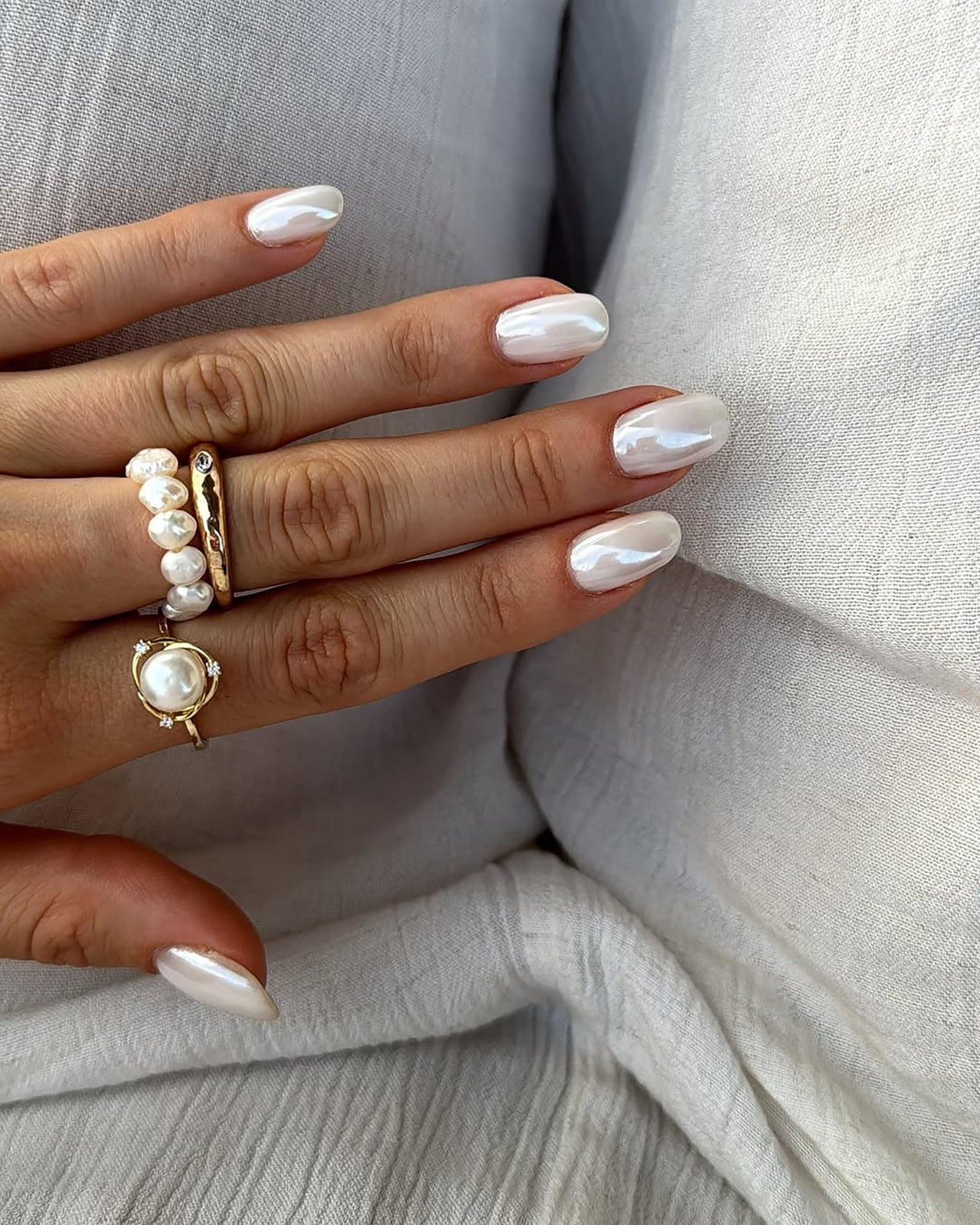 Milky White Chrome Shimmer Short Almond Nails, Close-Up Take — White Nails