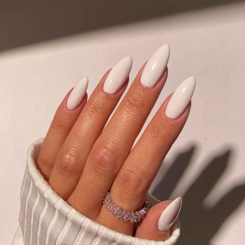 Opaque White Glossy Short Almond Nails, Close-Up Take — White Nails