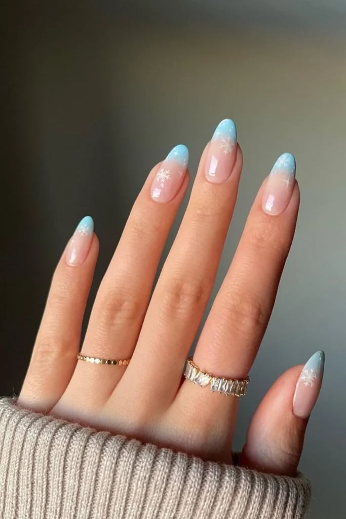 Light Blue to Nude Ombre Snowflake Medium Almond Nails Light Blue to Nude Ombre Snowflake Medium Almond Nails — Winter Blue Nails