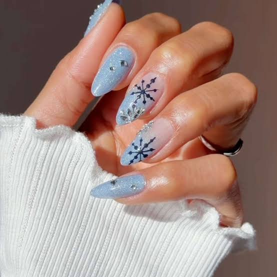 Pale Icy Blue Stiletto Snowflake Rhinestone Nails Pale Icy Blue Stiletto Snowflake Rhinestone Nails — Winter Blue Nails