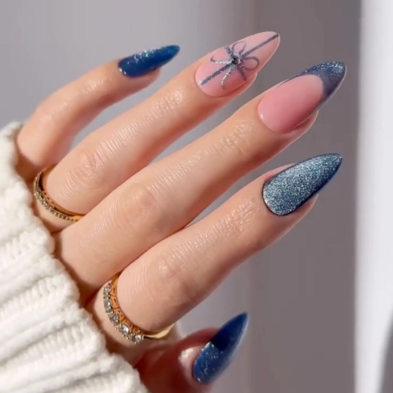 Shimmering Light Ice Blue Short Almond Nails Shimmering Light Ice Blue Short Almond Nails — Winter Blue Nails