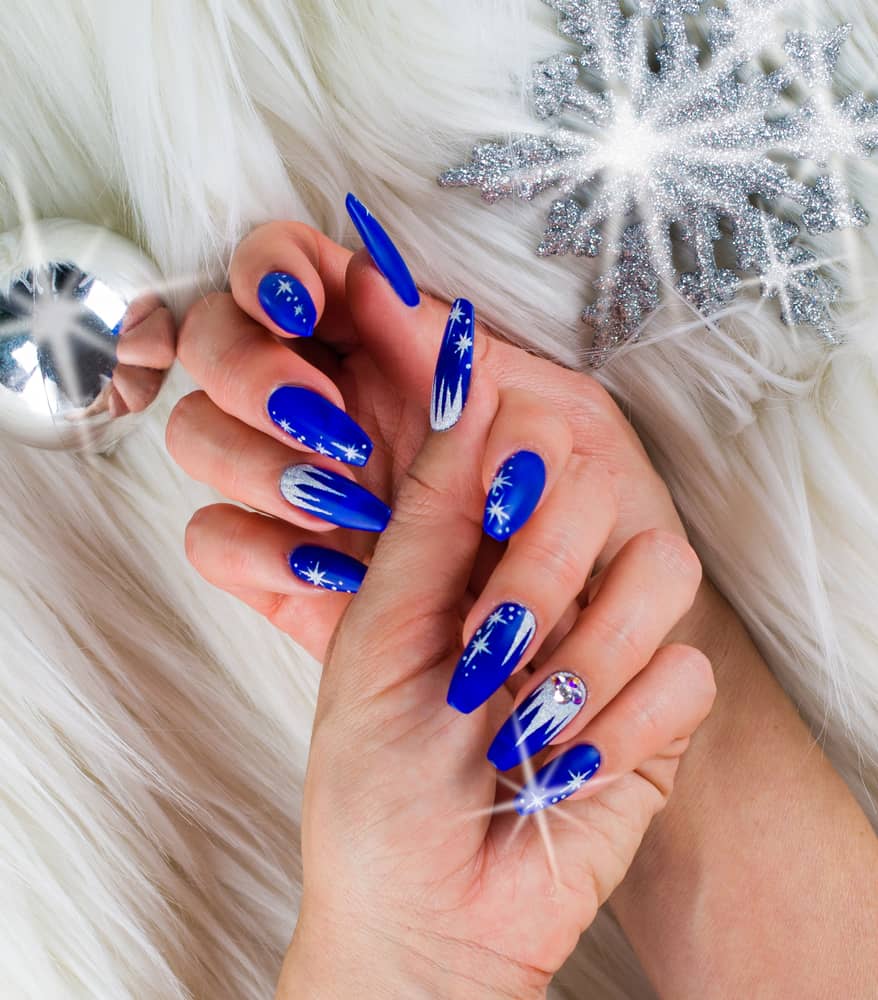 Vibrant Deep Blue Star Glitter Stiletto Nails Vibrant Deep Blue Star Glitter Stiletto Nails — Winter Blue Nails