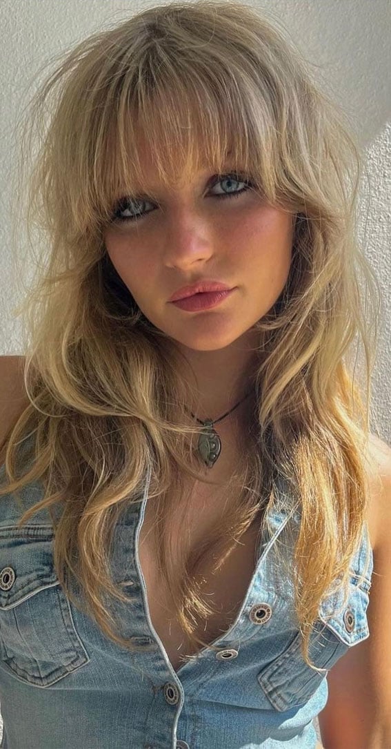 Blonde Shag Layers With Textured Wispy Bangs Blonde Shag Layers With Textured Wispy Bangs