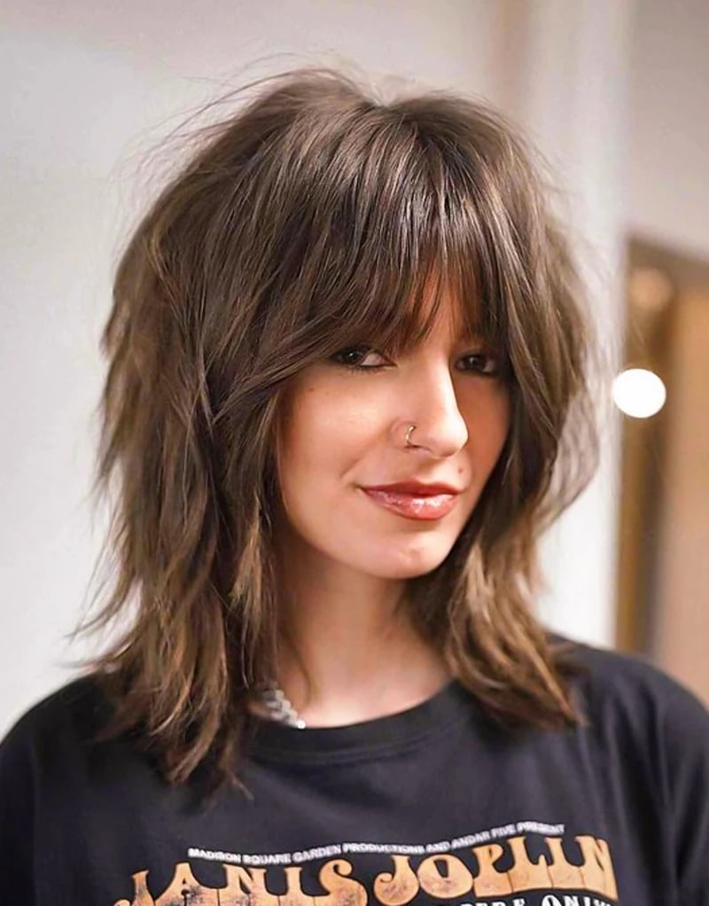 Mid-Back Shag With Textured Wispy Bangs Mid-Back Shag With Textured Wispy Bangs
