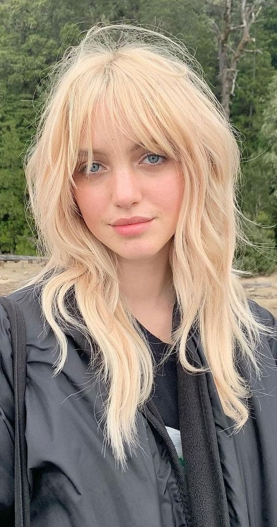 Light Blonde Wolf Cut With Full Bangs